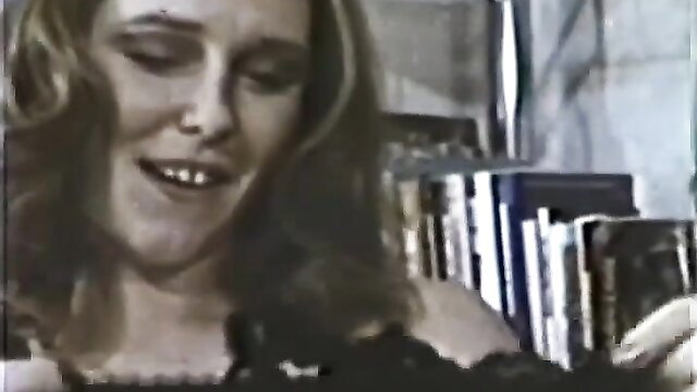 Vintage blonde smiling in lingerie by bookshelf in Fantasy Lane XXX