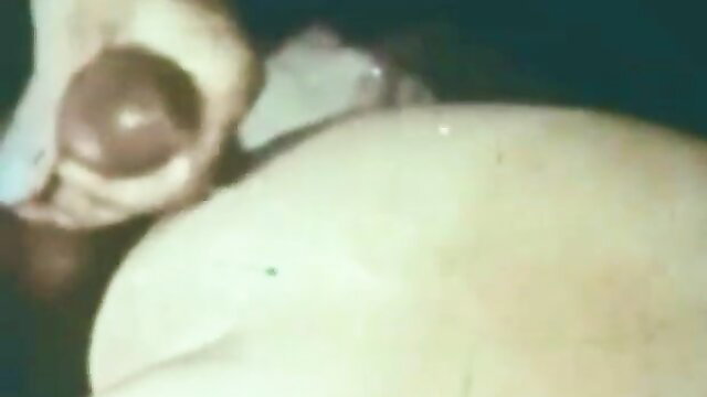 Vintage Danish XXX closeup of hand squeezing big tits and egg