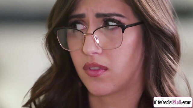 Jenna Sativa's aroused lesbian face in glasses, office threesome watch