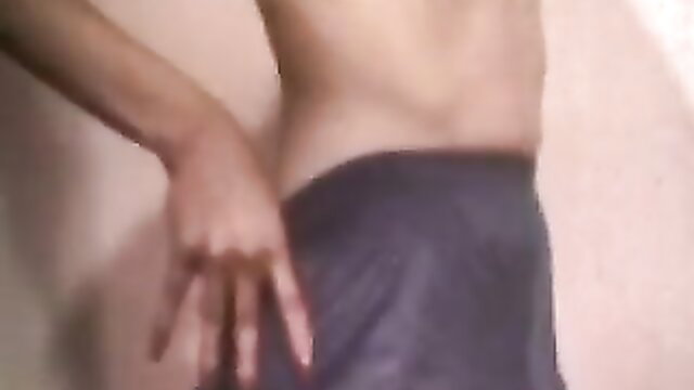 Rick Cassidy nude in tight pants, hand on hip, classic gay porn thumbnail