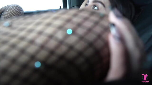 Latina babe in fishnet bodysuit teases in car POV OnlyFans