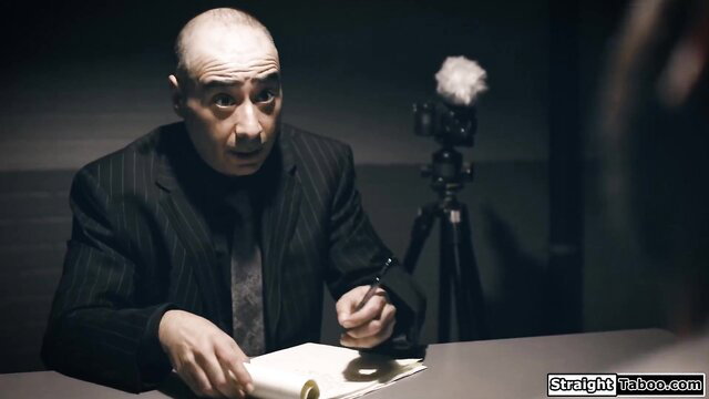 Emily Willis with bald man in suit, shocked expression, adult video thumbnail