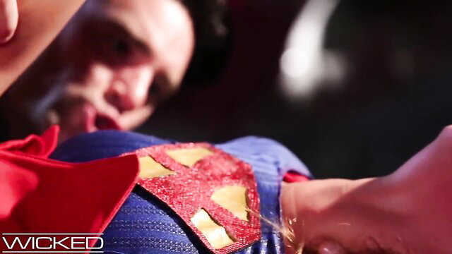 Superman parody sex scene with woman in superhero costume closeup