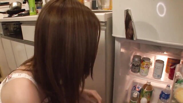 Tatsumi Yui bends over in kitchen, low-cut top, fridge open JAV