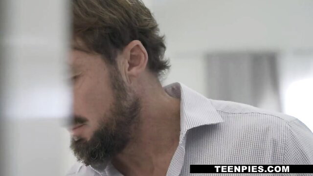 Madi Collins with bearded man in XXX therapy session