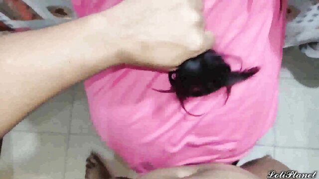 Stepbrother grabs black-haired girl's hair in pink dress during rough fuck