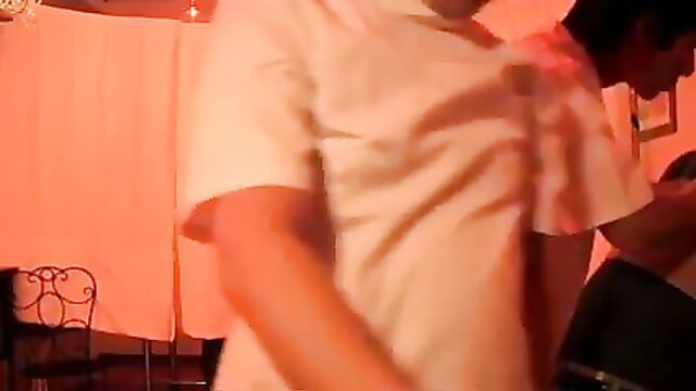 Japanese amateur couple foreplay in warm-lit room