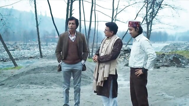 Three mature Indian men in traditional attire outdoors by river, MasterJi Ka Danda thumbnail