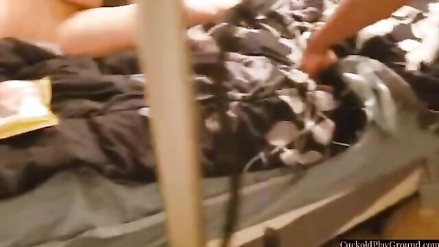 Cuckold husband films wife pleasuring BBC on bed