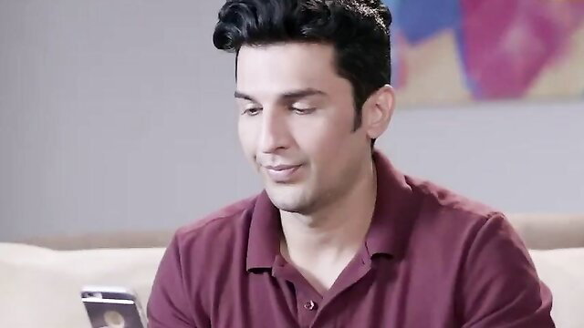 Handsome Indian man in maroon polo, seductive gaze, adult video thumbnail