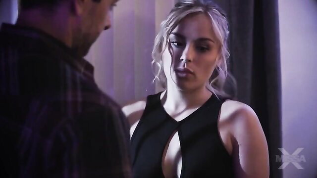 Anna Claire in tight black cutout dress, intimate bedroom stare