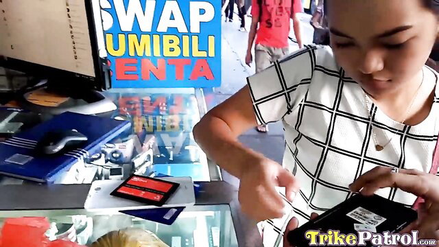 Cute Filipina teen at phone shop in tight white top, bubble butt tease