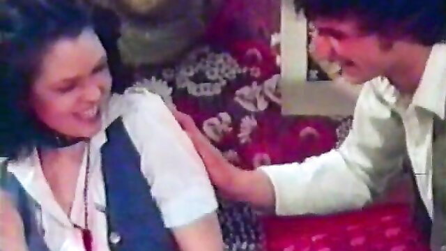 Retro 70s couple foreplay on couch in vintage anal sex porn