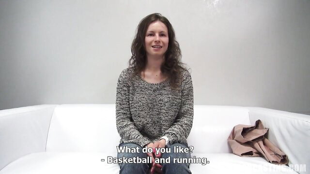 Pretty brunette amateur in sweater on casting couch interview