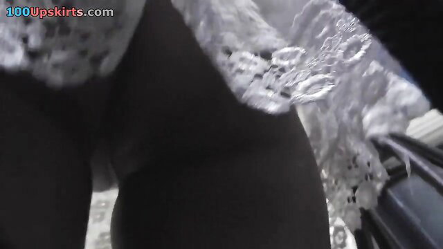 Black woman flashes g-string thong in candid upskirt video