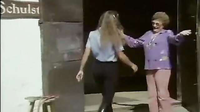 Vintage 1982 German porn: long-haired brunette in tight pants greets older woman at school door