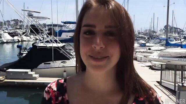 Lanie Morgan smiling at marina in floral dress audition