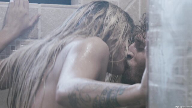 Blonde wet in steamy shower hardcore sex with tattooed man kissing neck