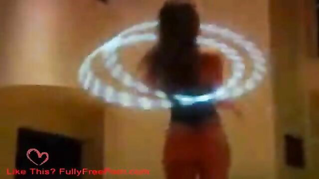 Remy LaCroix hula hooping topless, glowing LED hoop on big ass