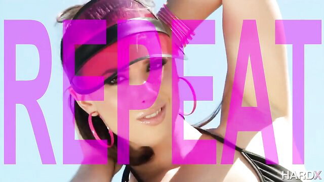 Hot brunette in pink visor and hoops gooning in shiny bikini top