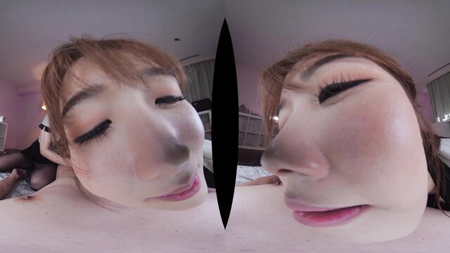 Two cute Japanese girls closeup faces in bed, JAV amateur style