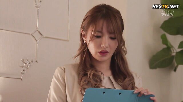 Tsubasa Amami in elegant blouse, holding folder in JAV debt sex scene