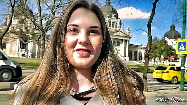 18yr curvy Lucie smiles outdoors by Budapest Parliament, big tits tease