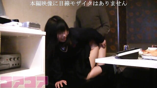 Japanese JK schoolgirl in short skirt bent over in karaoke room tease