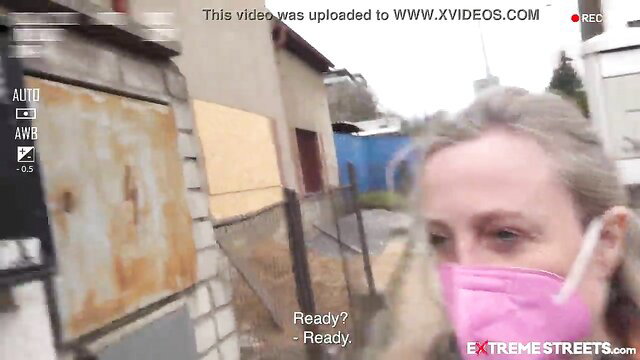 Extreme Streets mature woman in pink mask ready for vaginal prolapse action