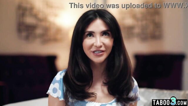 Jane Wilde smiling in floral top, petite brunette ready for taboo DP