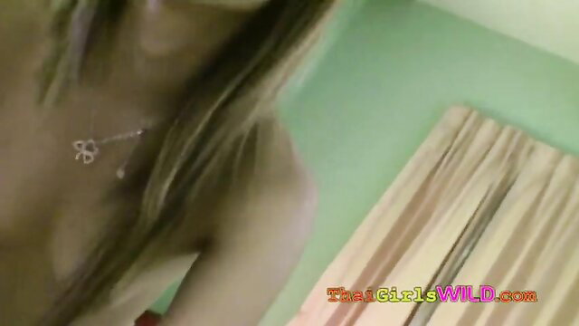 Blonde Asian hottie topless, necklace closeup in amateur video