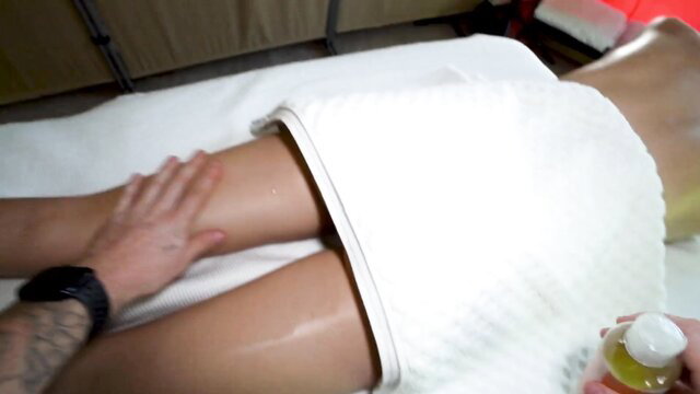 Brooke Tilli gets oily leg massage from masseuse in towel