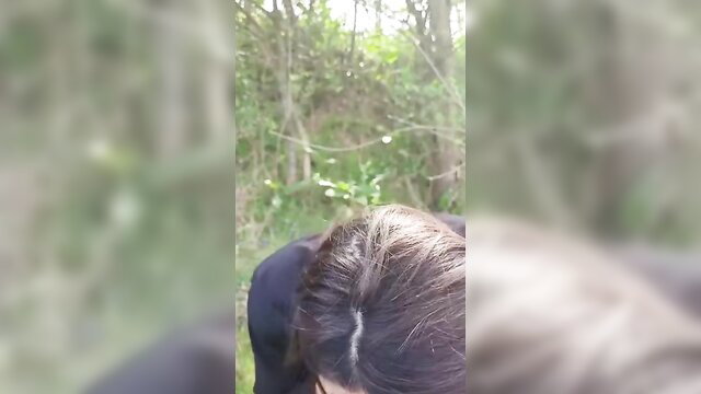 French MILF on knees in woods for outdoor blowbang