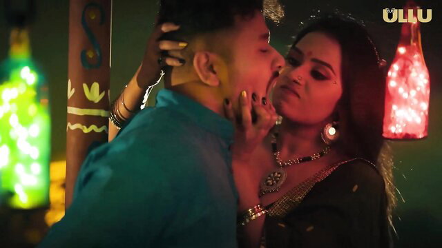 Desi Indian couple passionate kiss, wife in saree with husband