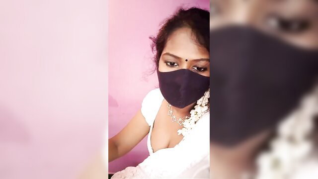 Hot Tamil YouTuber Phoenix in white saree, deep cleavage, mask & jasmine flowers
