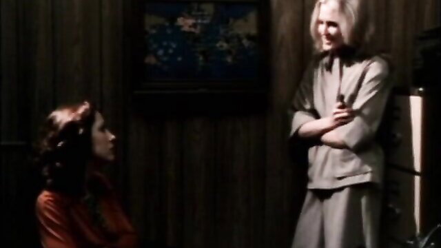 Blonde and brunette in steamy retro lesbian scene from Liquid Lips