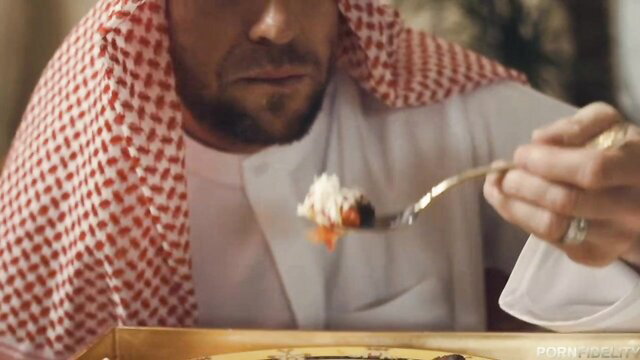 Nadia Ali in traditional hijab eating from spoon, Middle East fantasy