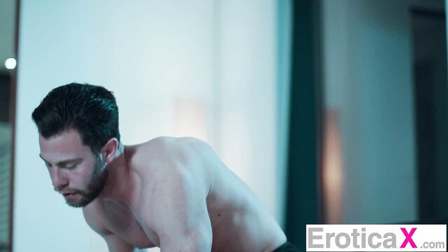 Muscular bearded man nude in erotic massage pose