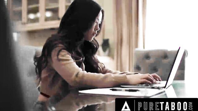 Lulu Chu typing on laptop in sexy sweater, Pure Taboo threesome tease