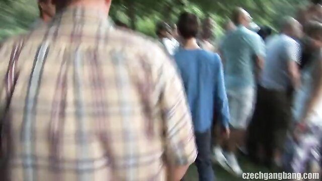 Susan Ayn gangbang party - group of men walking in park