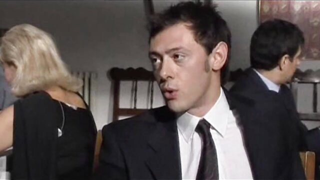 Michelle Wild in suit with women at Hooker Report party