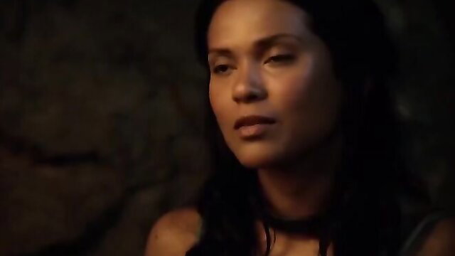 Stunning mixed-race woman with intense gaze in Spartacus scene