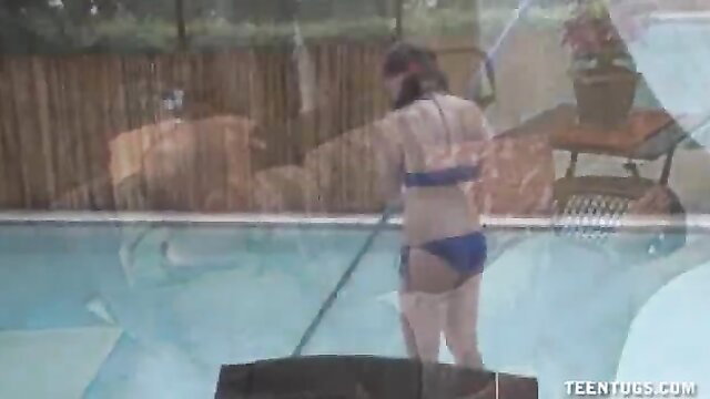 Brunette teen in blue bikini cleans pool pole outdoors, hot ass view
