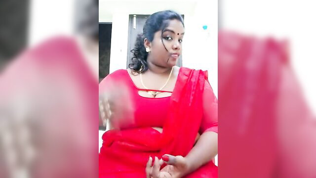 Curvy Tamil Malayali babe in tight red saree blouse, teasing cleavage