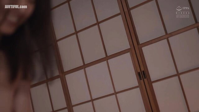 Asian beauty in kimono smiling seductively by shoji screens in My Brother's Wife JAV