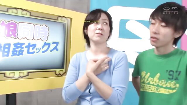 Japanese stepmom and stepdaughter on arousing gameshow, hands on chests
