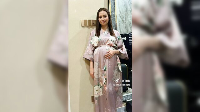 Pregnant Anna Jobling in silky pink kimono robe, Malaysian beauty