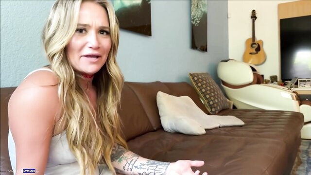 Athena Anderson blonde MILF in tank top on couch