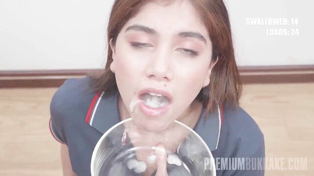 Marina Gold swallows massive cum load from glass in bukkake