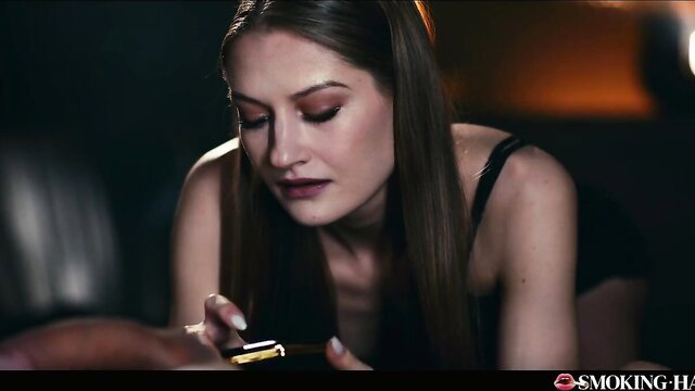 Tiffany Tatum smoking close-up in black lingerie